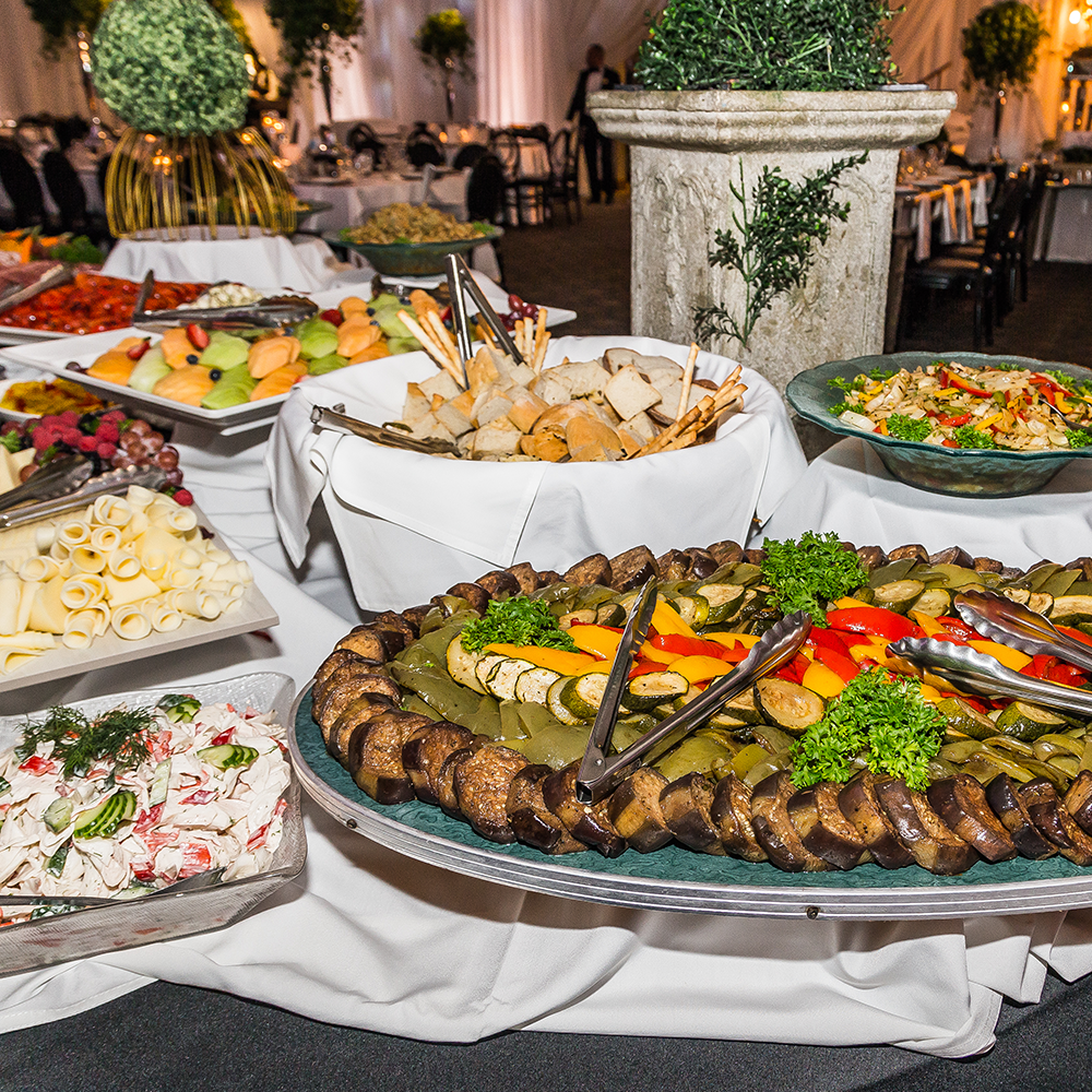 School sports banquet with team decorations and buffet catering for athletes and families.