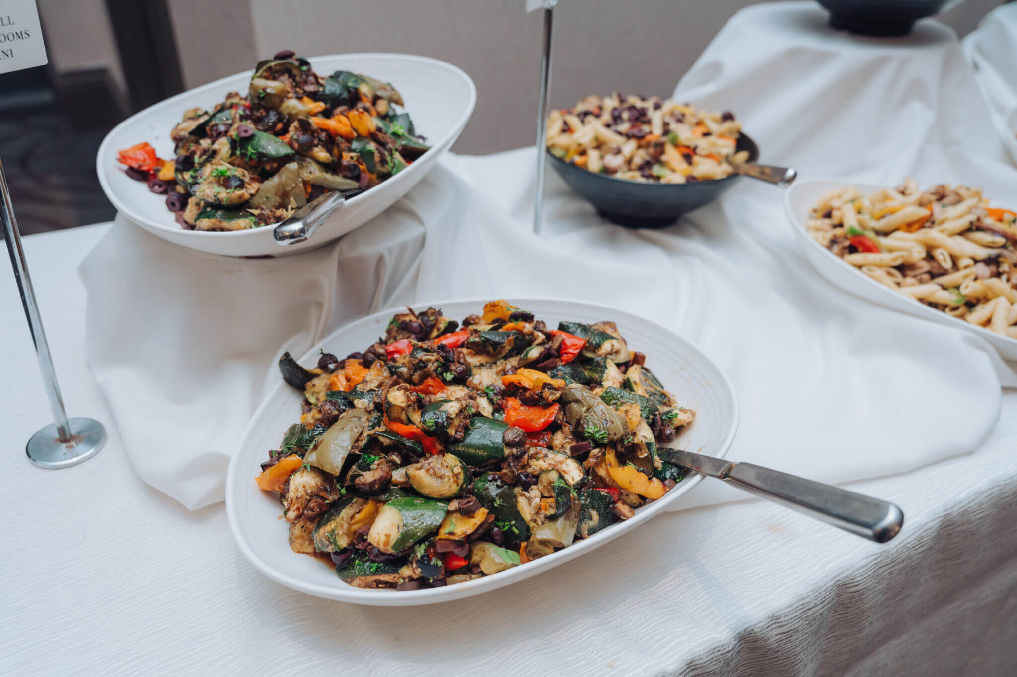 Middle Eastern catering package featuring hummus, shawarma, and mezze platters for social gatherings.