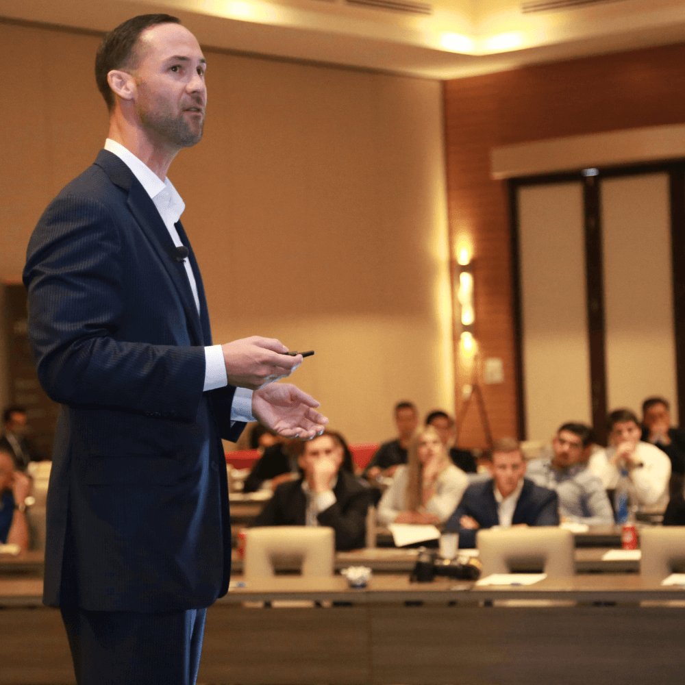 A modern meeting space with a table and chairs, ready for a corporate event.