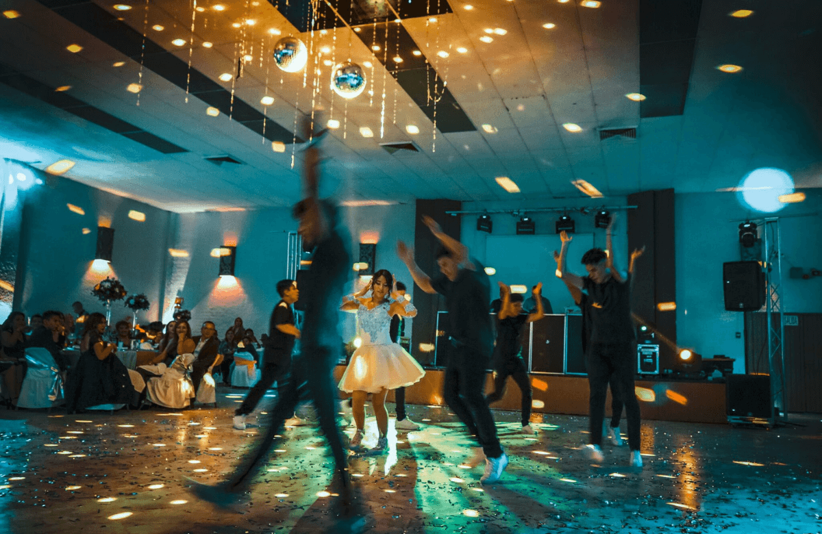 School prom celebration with dance floor, decorations, and professional lighting in our ballroom.