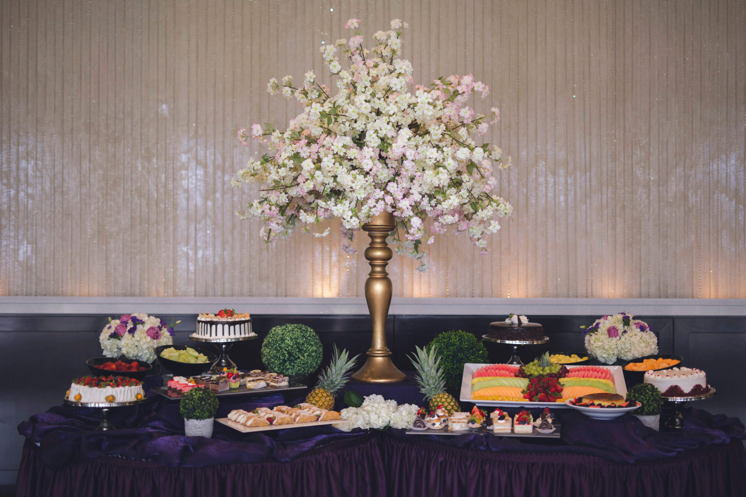 Wedding reception hall with elegant arch and decor, ready for your ceremony and celebration.